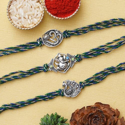 Image of eCraftIndia Set of 3 Lord Ganesha, Peacock, Om with Mace Rakhis, Best Bro Ever Fridge Magnet with Roli Chawal Pack - Rakhis for Brother, Bhabhi, Kids