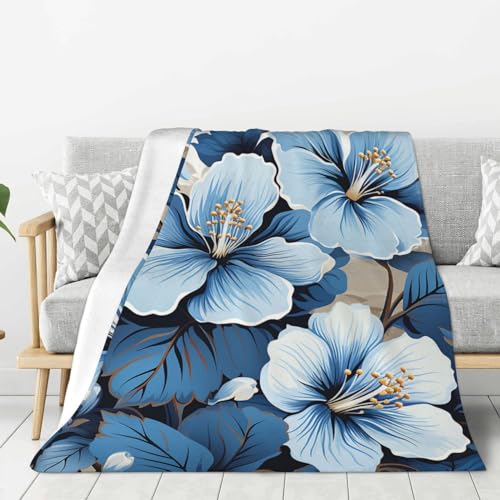 Couverture flanelle douce fleur bleue pour vos soirées canapé