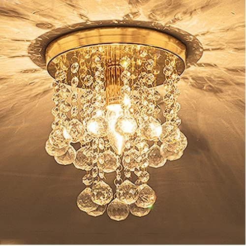 Petite lampe forme ronde or en cristal pour illuminer un couloir sombre