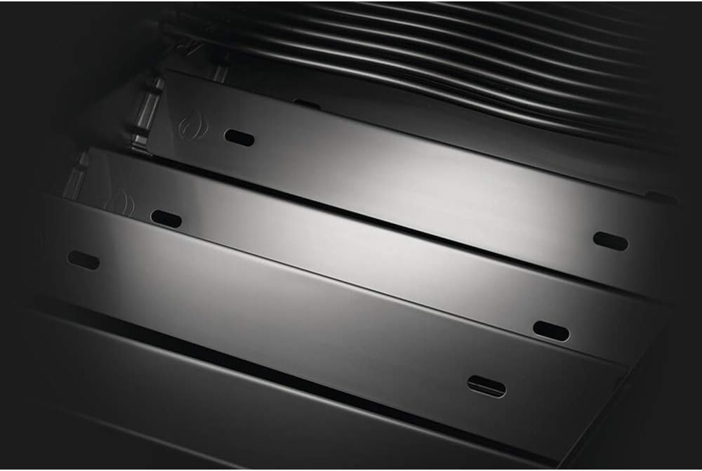 Close-up of the stainless steel sear plates above the burners