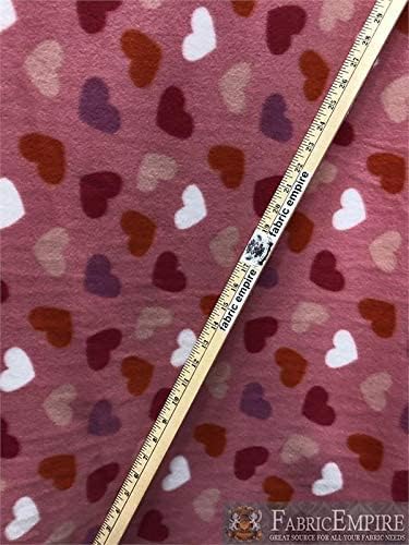 Tela con estampado de forro polar con fondo rosa de corazones coloridos58 pulgadas de anchovendido por The Yard