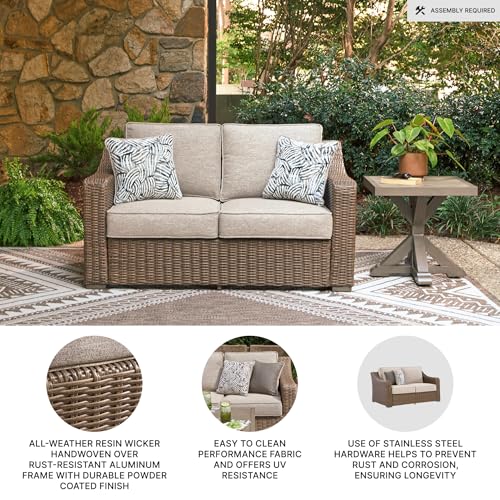 Image of Signature Design by Ashley Carmel Bay Outdoor Loveseat with Cushion, Beige | All-weather resin wicker over rust-resistant aluminum frame, Roomy 60-inch seating, Fade-resistant cushions