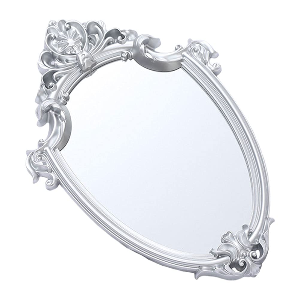 Miroir mural argenté au charme vintage pour une atmosphère douce et élégante