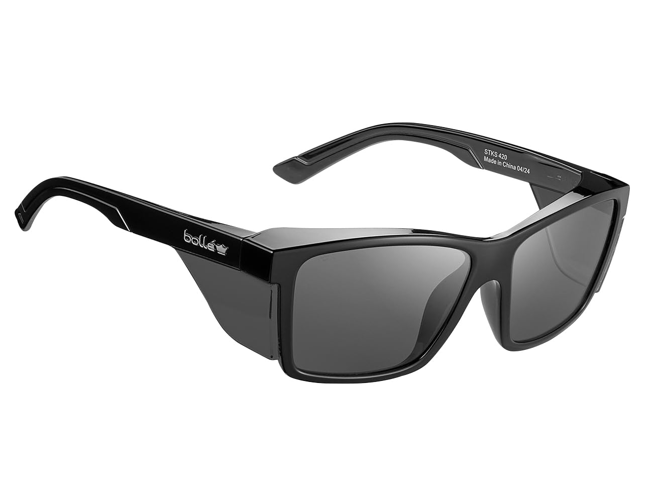 Bollé STKS 420 safety glasses with black gloss frame and smoke lens, designed to support eye protection, durability and comfort for on‑site work and everyday professional use.