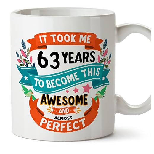 MUGFFINS Tazas 63 Cumpleaños - En Inglés - It took me 63 years to become perfect - 11 oz - Regalo original y divertido