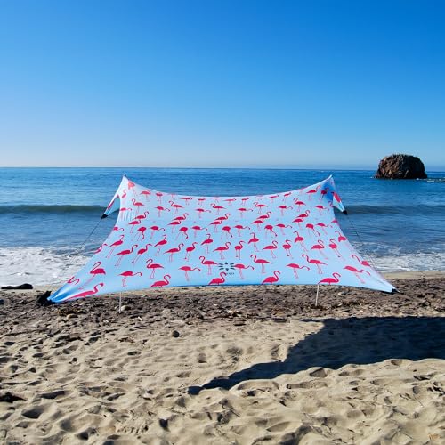 Image of Neso Gigante Portable Beach Tent Sun Shelter - Lightweight Beach Shade Canopy - Easy Setup for Family Outings - Patented Reinforced Corners - UPF 50+ Sun Protection - 8ft Tall, 11 x 11ft - Flamingos