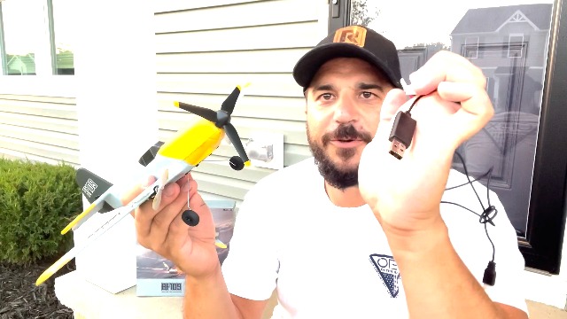 Remote controller diagram showing battery compartment.