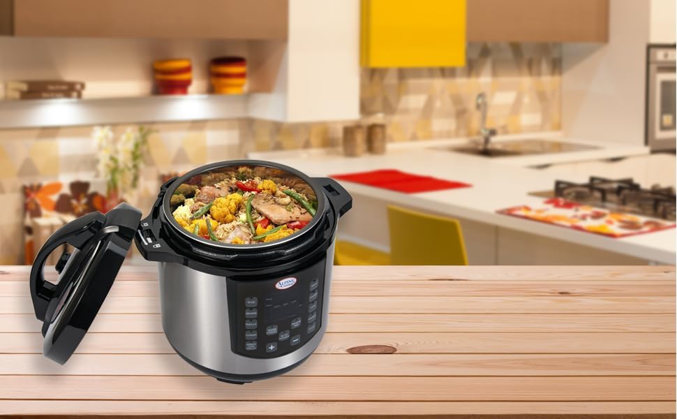 Alpine Cuisine Electric Digital Pressure Cooker in a kitchen setting, filled with cooked food