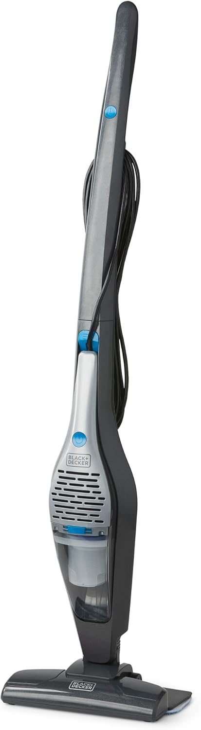 Close-up of the BLACK+DECKER 5-in-1 Vacuum & Mop head cleaning a hard floor with debris.