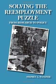 Paperback Solving the Reemployment Puzzle: From Research to Policy Book