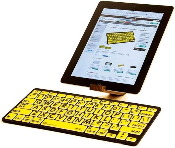 LogicKeyboard XL Print Bluetooth Mini Keyboard positioned next to an Apple iPad.