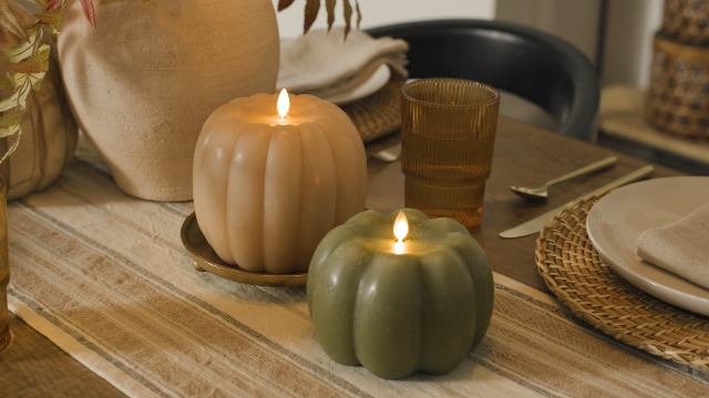 Image of Luminara Tall Pumpkin Figural Flameless Flickering Moving Flame LED Candle (5.7 inch x 5.5 inch), Chalky Finish Real Unscented Wax, Time Function (Irish Cream)