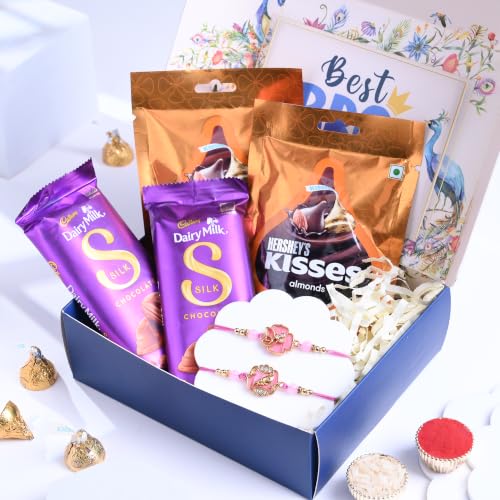 Image of FlowerAura Rakhi For Brother With Chocolate - Set of 2 Pink Floral Rakhi With 4 Chocolates & Roli Chawal Tikka In Box - Festive Hamper Gift For Brother | Bhai | Cousins (Same Day Delivery)