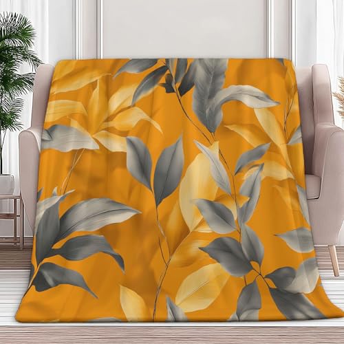Couverture polaire jaune dorée pour vos soirées cocooning canapé