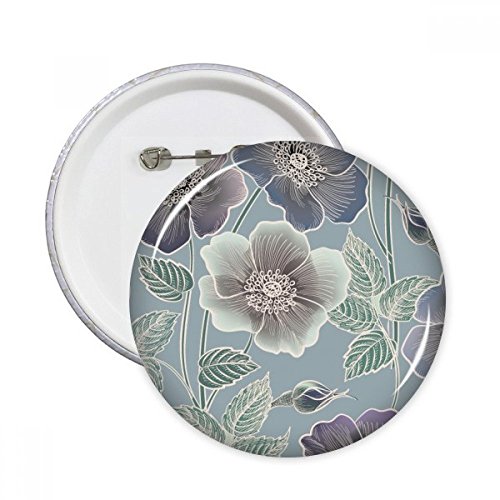 Badge rond fleur art dessin gris pour masquer un accroc sur un vetement