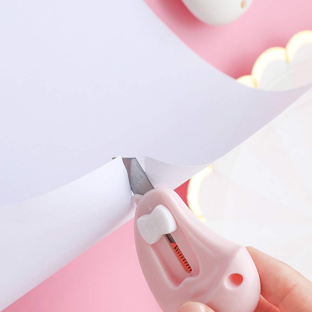 Taglierina per carta da regalo con coltelli su entrambe le estremità
