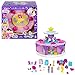 Polly Pocket GYW06 - Odliczanie do urodzin, zestaw zabawowy w kształcie tortu urodzinowego z pudełkiem na ciasto, 7 miejsc do zabawy, 25 niespodzianek, od 4 lat Wielokolorowe