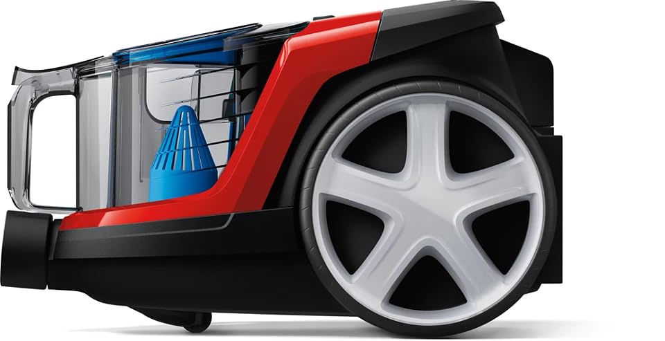 Philips PowerPro Compact Vacuum Cleaner in use on a rug