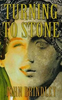 Paperback Turning To Stone Book