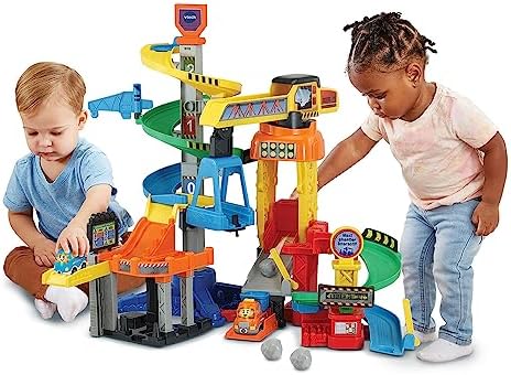 VTech - Tut Tut Bolides, Maxi interaktywna budka z samochodem Eden Truck Benne, tor samochodowy dla dzieci, 6 magicznych obszarów, prezent dla chłopców i dziewczynek od 1 roku do 5 lat - zawarte w