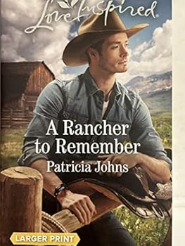 Mass Market Paperback A Rancher to Remember [Large Print] Book