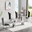 Silver Table and 4 Black Chairs