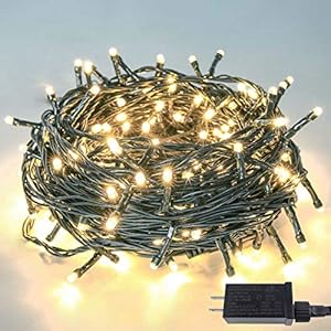 Upgraded 82ft 200 led christmas string lights outdoorindoor timer memory function 8 modes extendable green wire waterproof fairy string lights for xmas tree holiday party garden warm white  urban country home decor