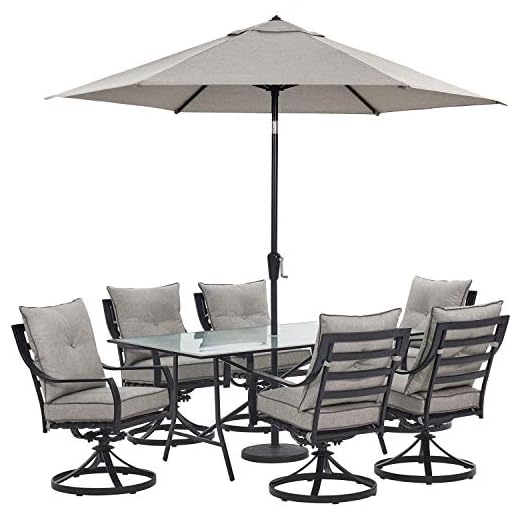 Hanover Silver Linings with 6, 66" x 38", Base Lavallette 7-Piece Modern Outdoor Dining Set with Umbrella 2 Swivel Rockers, 4 Stationary Chairs 66'' x 38'' Glass-Top Table Weather, UV Resistant