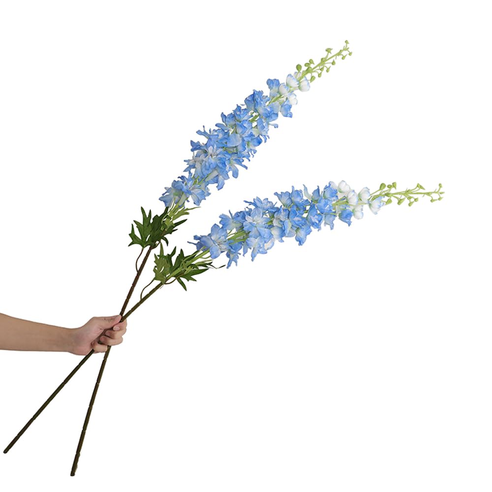 Fleurs d'alouette artificielles bleues pour une décoration de salon élégante