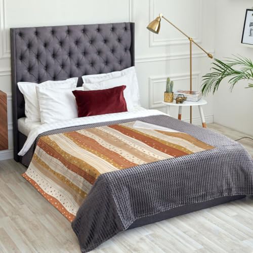 Jeté à rayures rustique d'automne pour cocooning sur le canapé