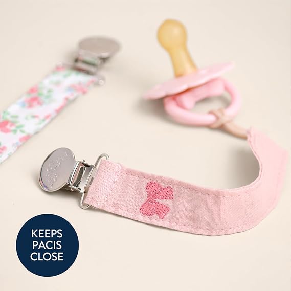 Itzy Ritzy Fabric Pacifier Strap, Universal Pacifier Clip Set of 2 (Bows) | Soft Fabric Pacifier & Toy Straps Attach to Clothing, Strollers & Bags to Keep Baby Essentials Clean, Secure & Easy to Find