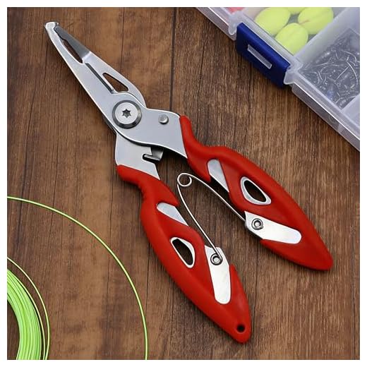 Fishing line cutter tool with spring-loaded red grip, compact cutting pliers for lure rigging, knot tag trimming, and tackle box storage, 1 piece