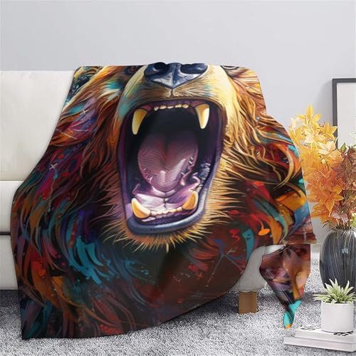 Couverture de voyage microfibre contre les frissons du soir sur le canapé