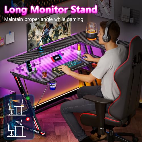 Image of Korfile 47 Inch Gaming Desk with Power Outlet & LED Lights, Corner Computer Desk with 3 Tiers Storage Shelves, Home Office Desk with Monitor Stand for Small Space, Carbon Fiber Black