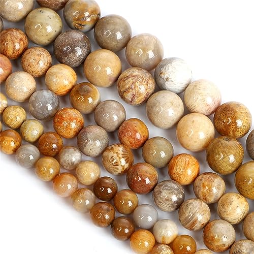 Perles de jade de corail de qualité supérieure. Des perles d'espacement rondes pour joaillerie
