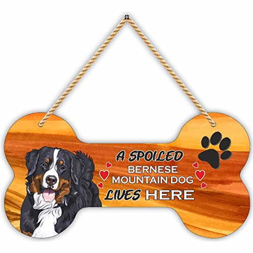 Image of CVANU Laser Cut MDF Wooden Funny Dog Sign Plaque Bone Design A Spoiled Bernese Mountain Dog Lives Here Animal Love Sign Board, Name Plate for Dog House Black & White, Size(10x5) inch