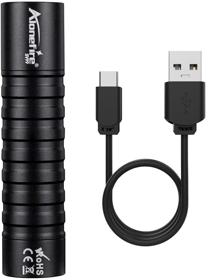 NALACAL SV99 UV Flashlight and USB-C cable laid out