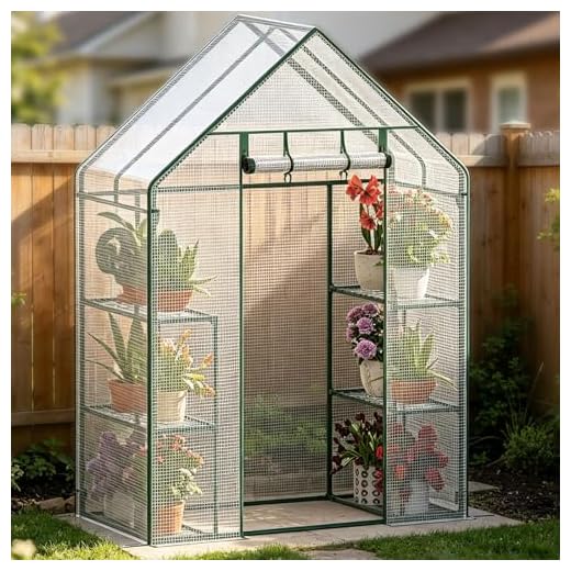Oumefar Warmes Gewächshaus, 143 x 73 x 195 cm Tragbares Gartengewächshaus PVC Korrosionsbeständig Warmes Gewächshaus Blumenpflanzen Gartenarbeit im Freien Für Zimmerpflanzen 14 Verdego Gewächshaus 143 x 73 x 195 cm, Foliengewächshaus mit 3 Ebenen, Aufrollbare Tür, PE Gitterfolie, Tomatengewächshaus Winterfest Wetterfest UV-Beständig, Tomatenhaus Garten, Balkon, Weiß