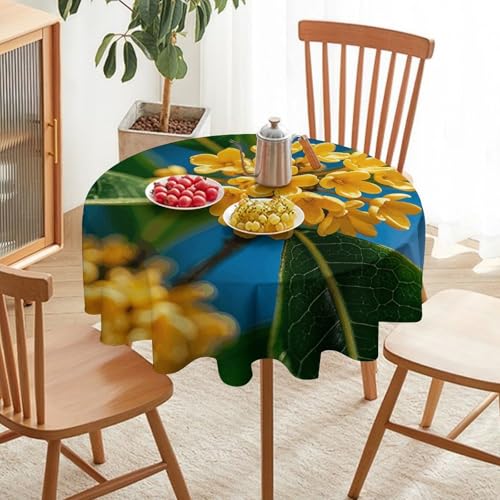 Nappe ronde anti-tache avec fleurs d'osmanthus pour préserver votre table