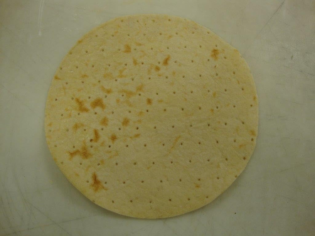Alive and Kicking Par Baked Thin Pizza Crust -- 80 per case.