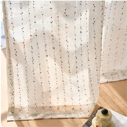 Visillo bohemio con pompones HaraDeco para decorar un dormitorio rustico 5