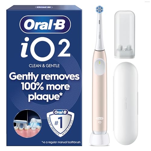 Oral-B iO2 Electric Toothbrush, 1 Gentle Care Toothbrush Head, 1 Travel Case, 1 Travel Refill Holder, Toothbrush for Adults (Calm Pink), Designed by Braun, 2 Pin Plug