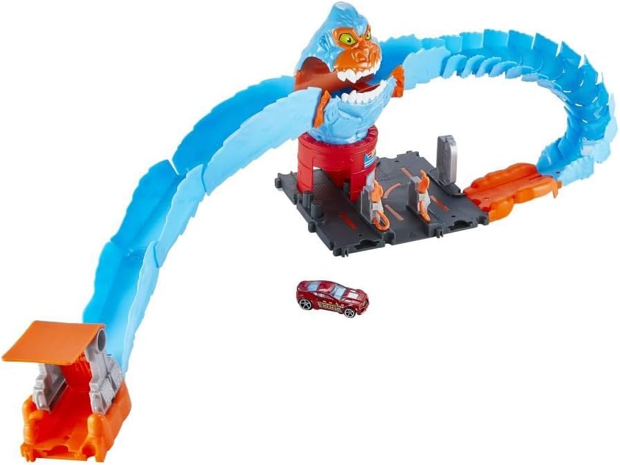 Multiple Hot Wheels City playsets connected on a floor