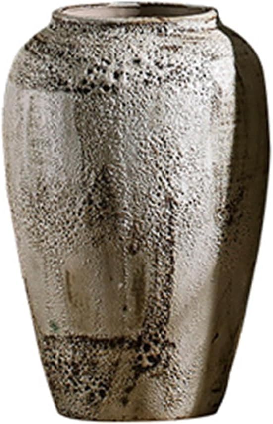 Vase en céramique rustique boudins pour bouquet de fleurs séchées sur table basse de salon