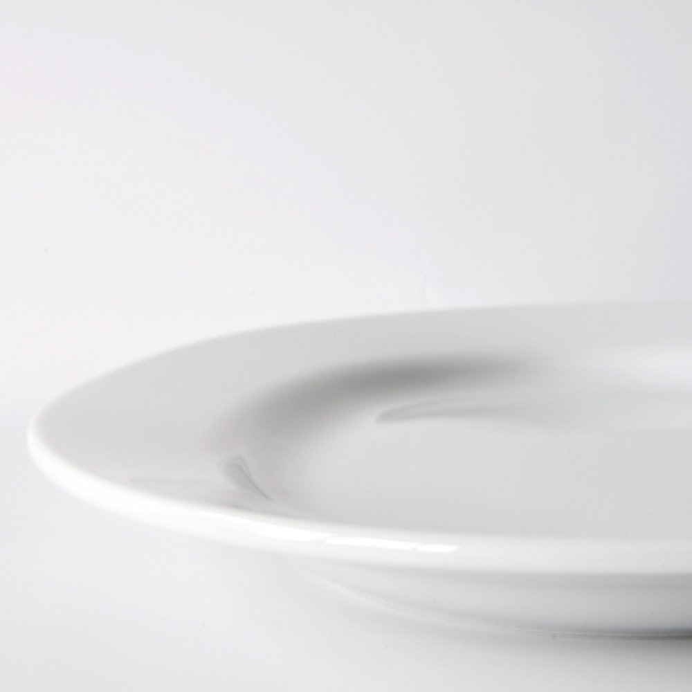 A di Alessi - AJM28/22 - PlateBowlCup Piatto da portata ovale in porcellana bianca.