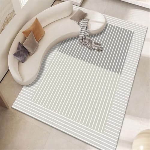 Tapis de salon doux gris et géométrique pour créer un cocon cocooning