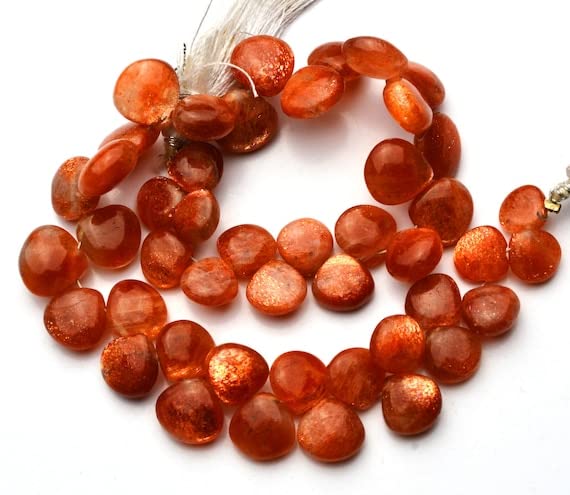 Pierre de soleil en cœur pour fabriquer des bijoux bohèmes d'été faits main