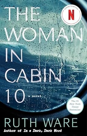 The Woman in Cabin 10 by Ruth Ware, depicting a circular window on a boat with raindrops on the outside overlooking a sea.
