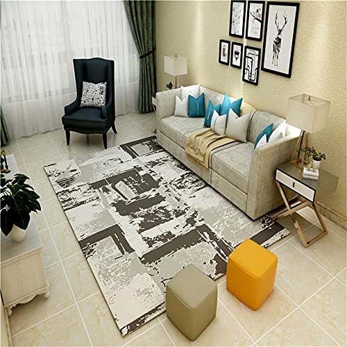 Tapis Moma Grey de salon moderne au design graphique abstrait et format coussin de sol 40x60