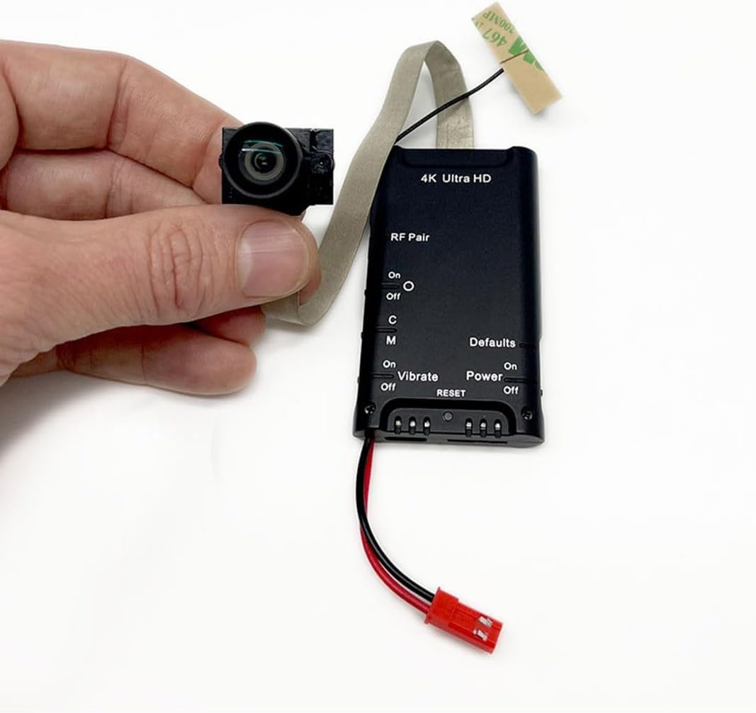 Жакын план view of the Lawmate PV-DY40UWW main unit with the camera module connected.